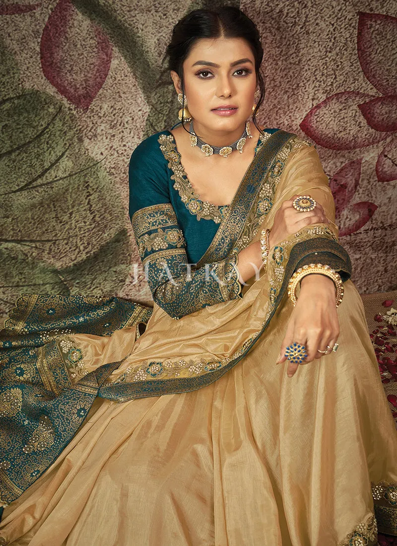Beige And Turquoise Embroidery Traditional Crepe Silk Saree
